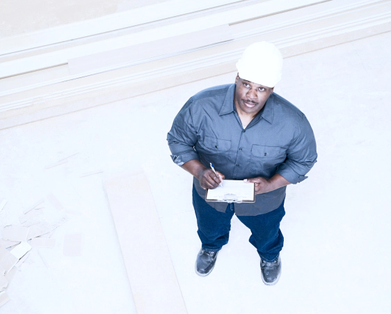 man white helmet looking up commercial inspection corpus christi tx
