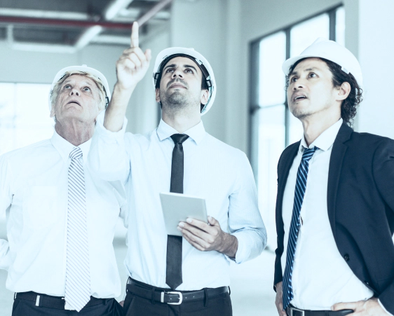 real estate agent with clients checking commercial building corpus christi tx